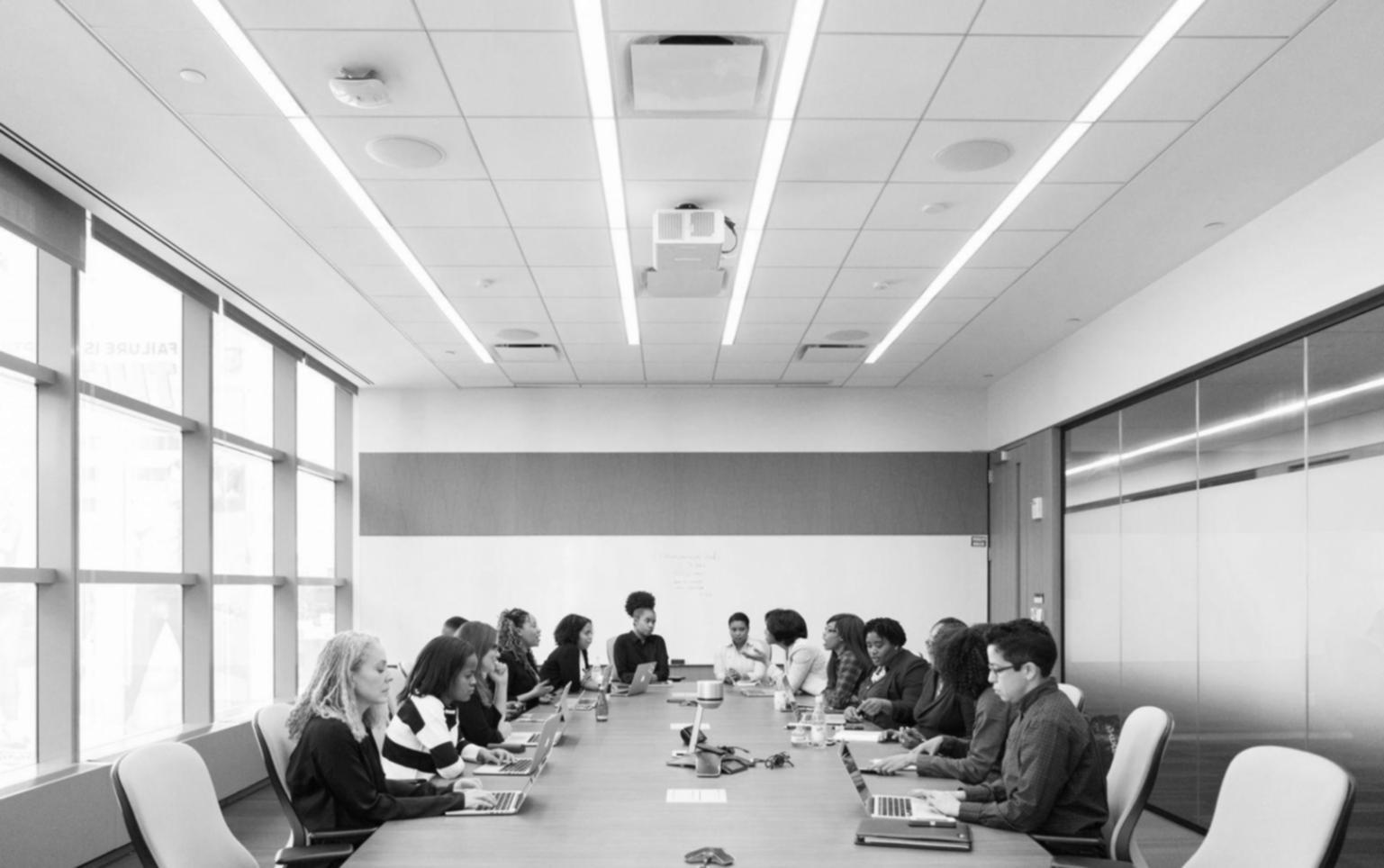 Professional business training environment with modern technology setup