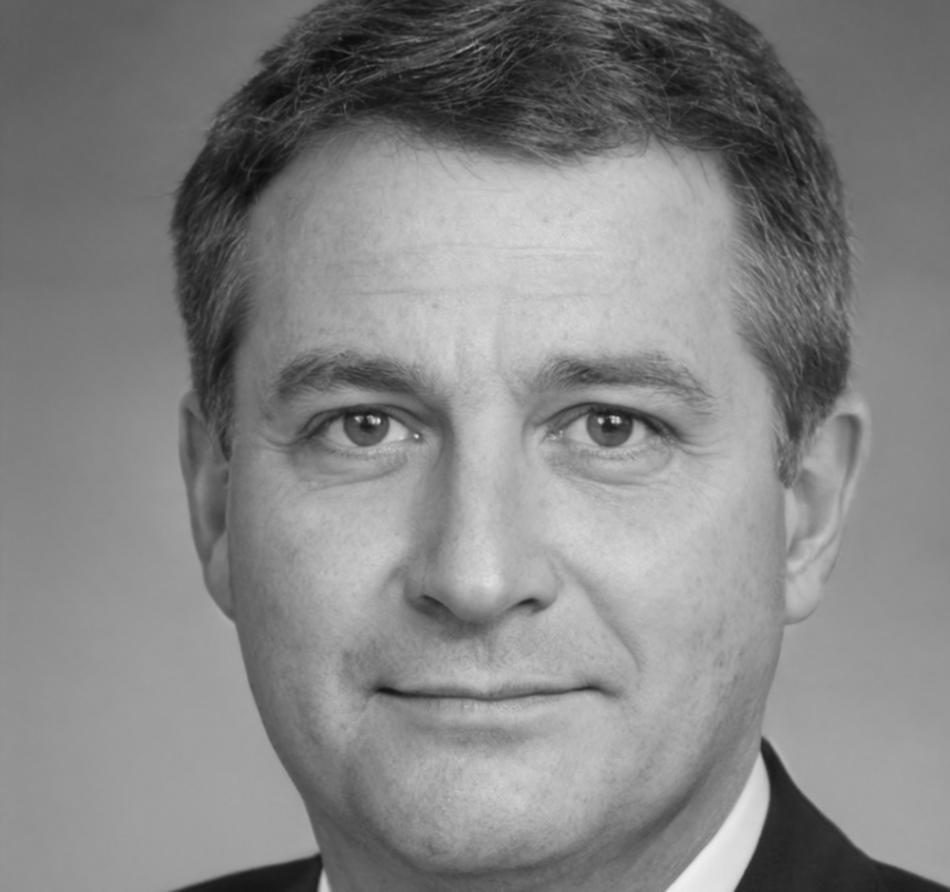 Professional headshot of Ethan Kavanagh, Financial Director