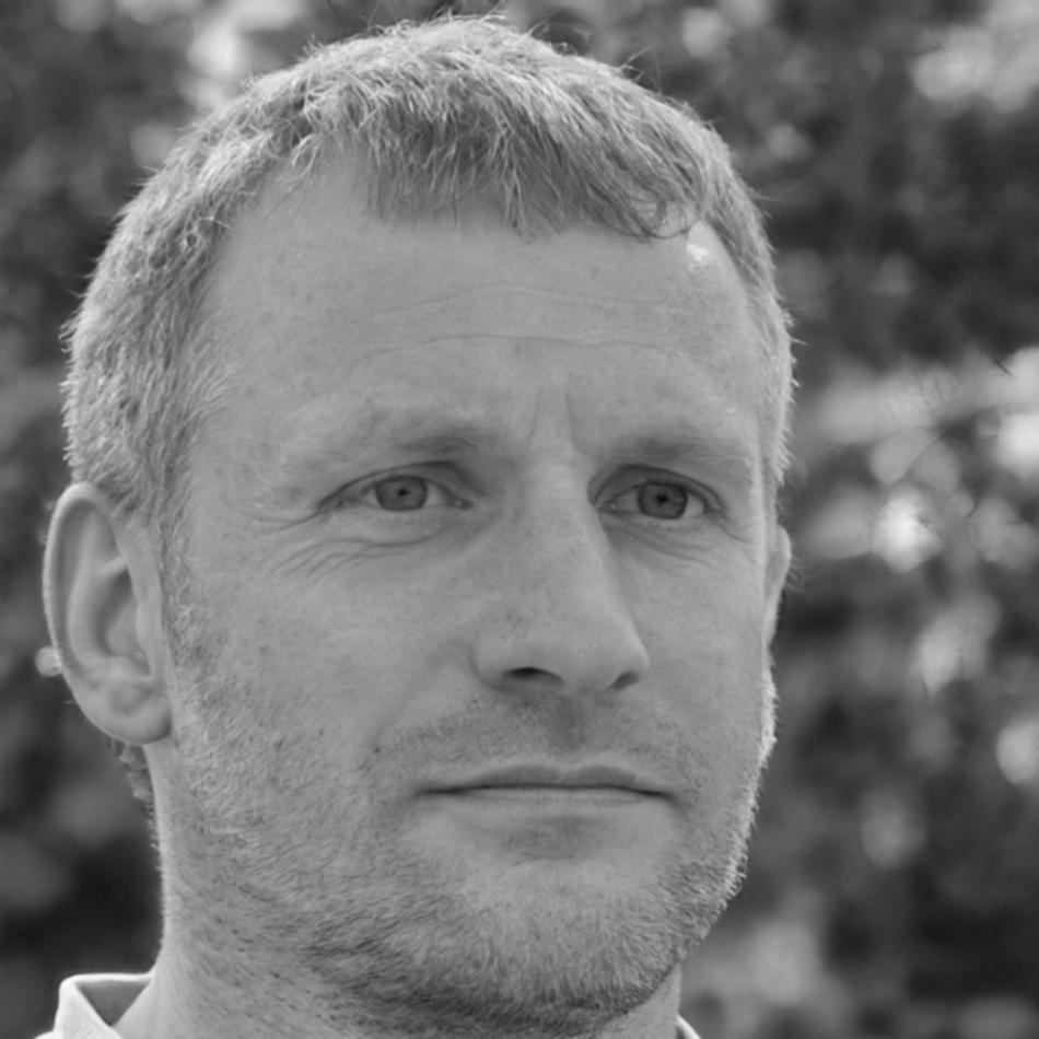 Professional headshot of Kieran Thornfield, successful program graduate